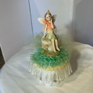 Whimsical Fairy Cake Topper with Green and Orange Details